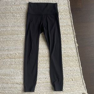 Lululemon black 3/4 length tights size 4